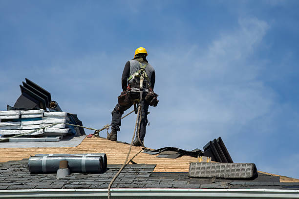 Professional Roof Replacement technician working in Teaneck, NJ